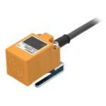 Orange Omron photoelectric sensor with mounting bracket and cable (industrial automation device)